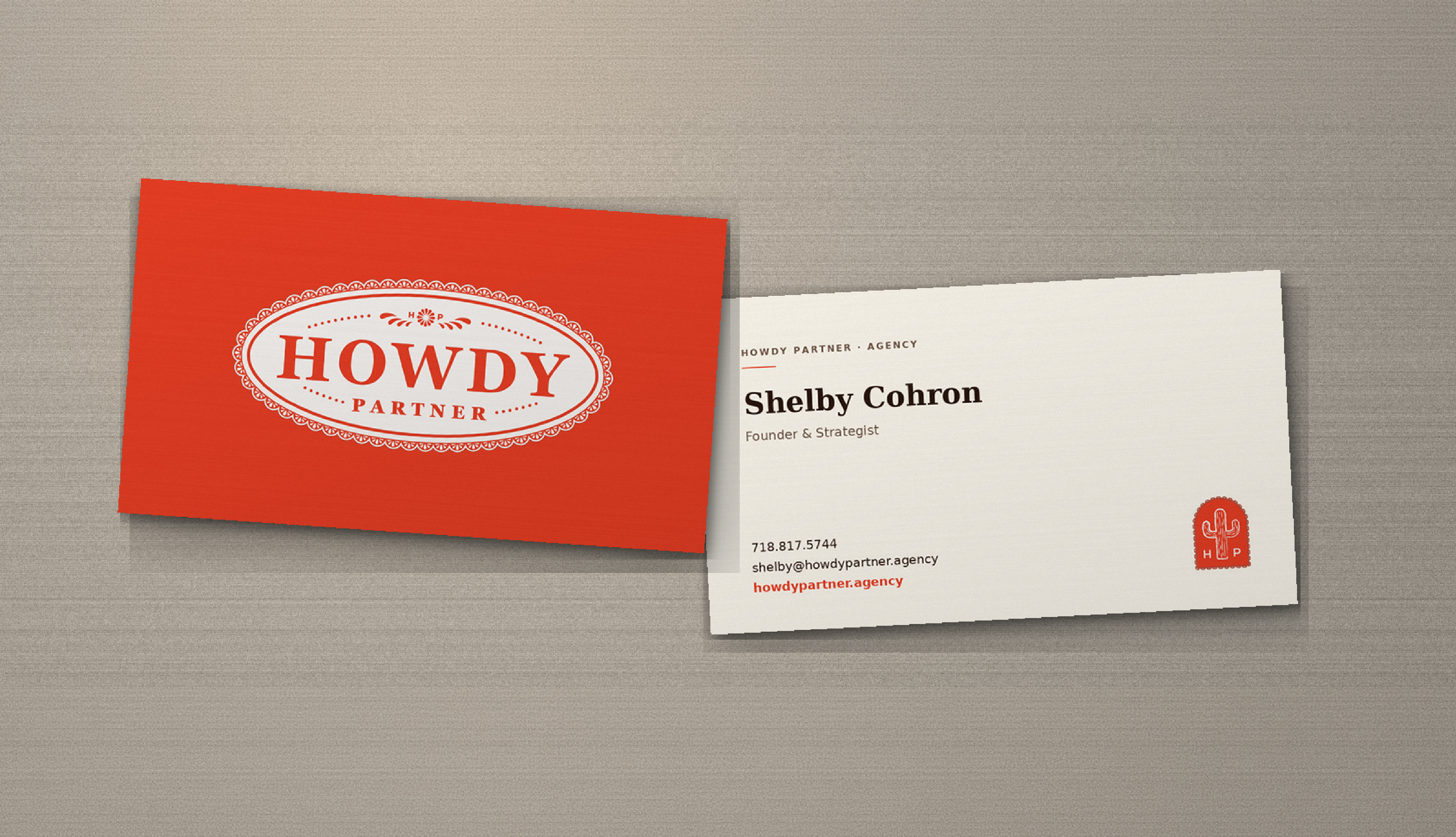 Howdy Partner business cards, front and back, for founder Shelby Cohron