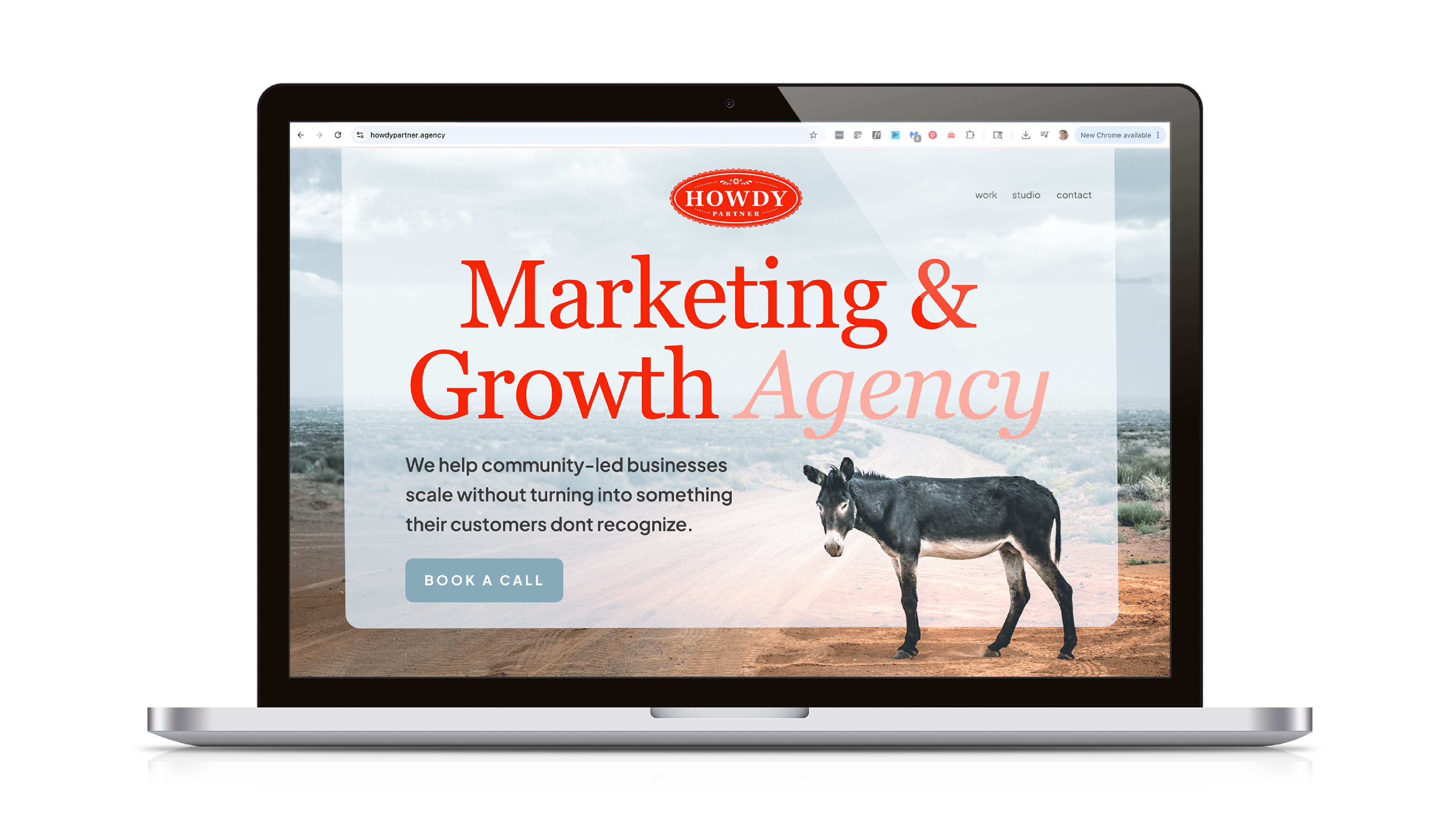 Howdy Partner agency website homepage on a laptop